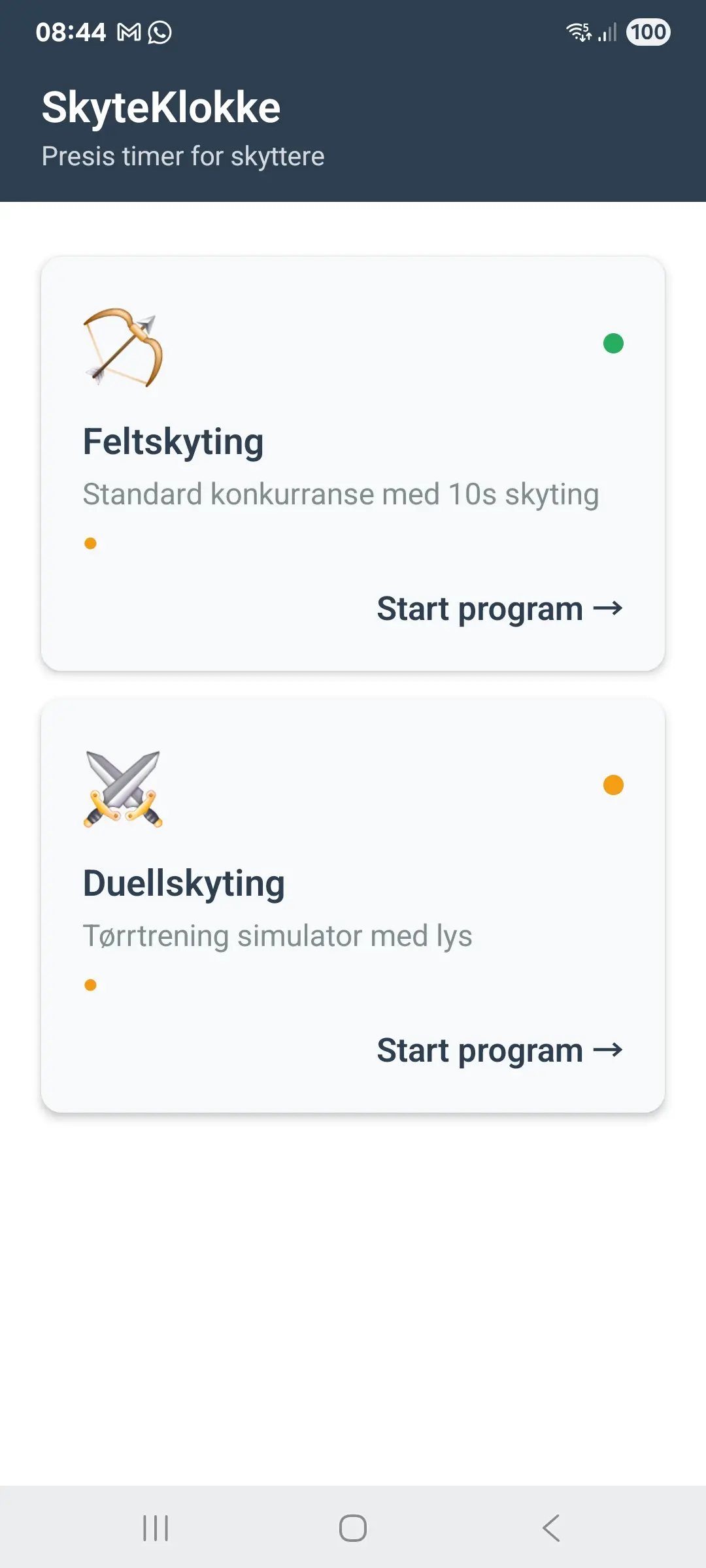 SkyteKlokke hovedskjerm med meny som viser programmene Standard Duel, Feltmatch, Innstillinger og Om